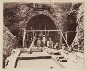 Indian laborers digging one of the many railroad tunnels